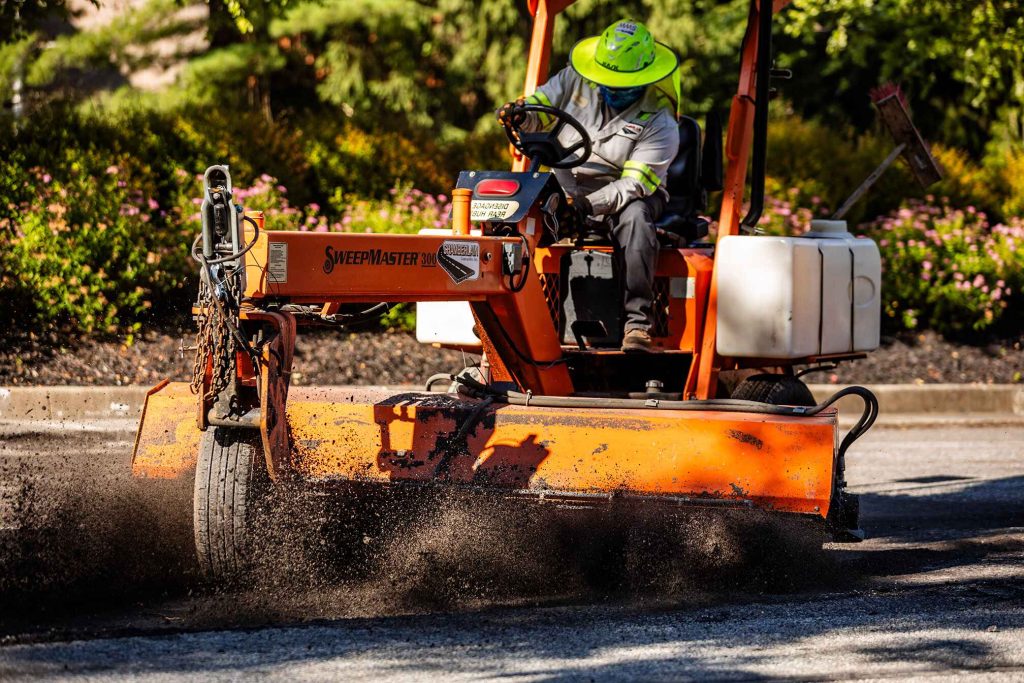 Contractor operating a Sweepmaster 300