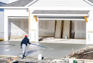Man Working On Smoothing Concrete