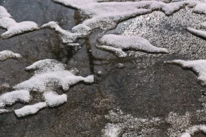 snow on the asphalt melts