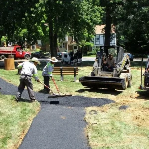 Paving contractors paving at community park