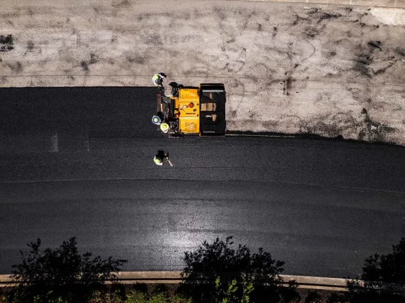 Chamberlain Contractors Laying a Fresh New Layer of Asphalt