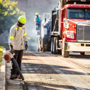View of paving contractor providing milling and paving services
