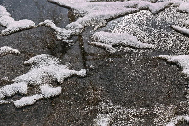 snow on the asphalt melts