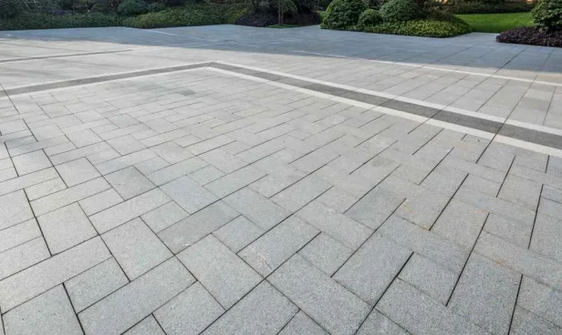 Gray marble tiles on the square in the residential area garden